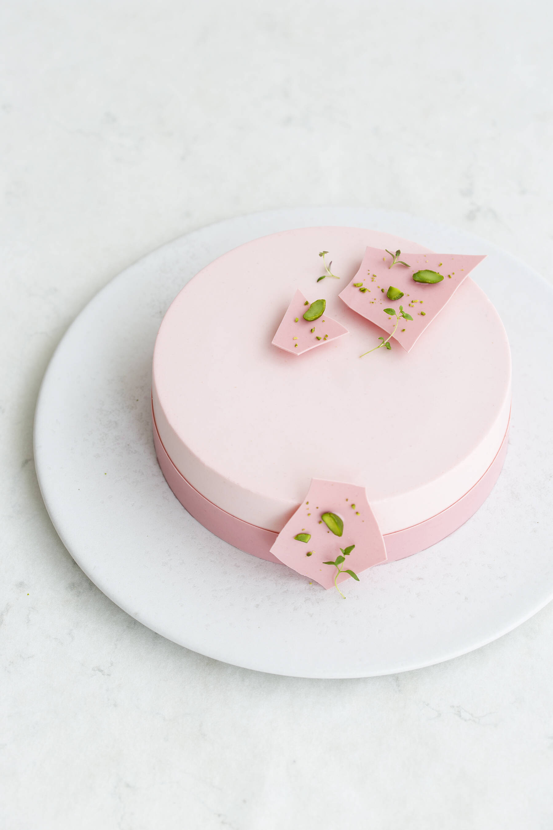 Raspberry cake with thyme, pistachio and lime