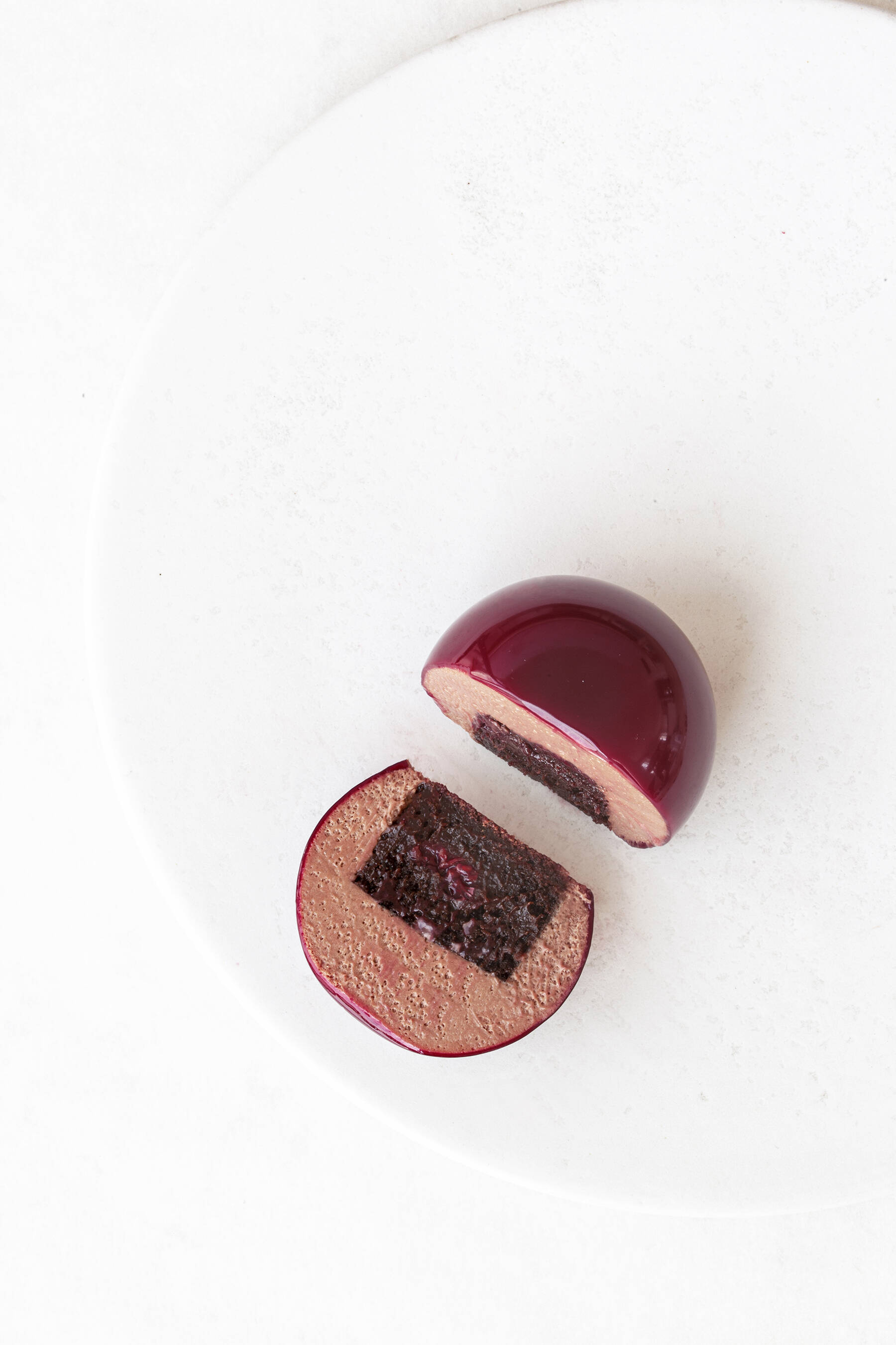 Brownie planet with raspberry