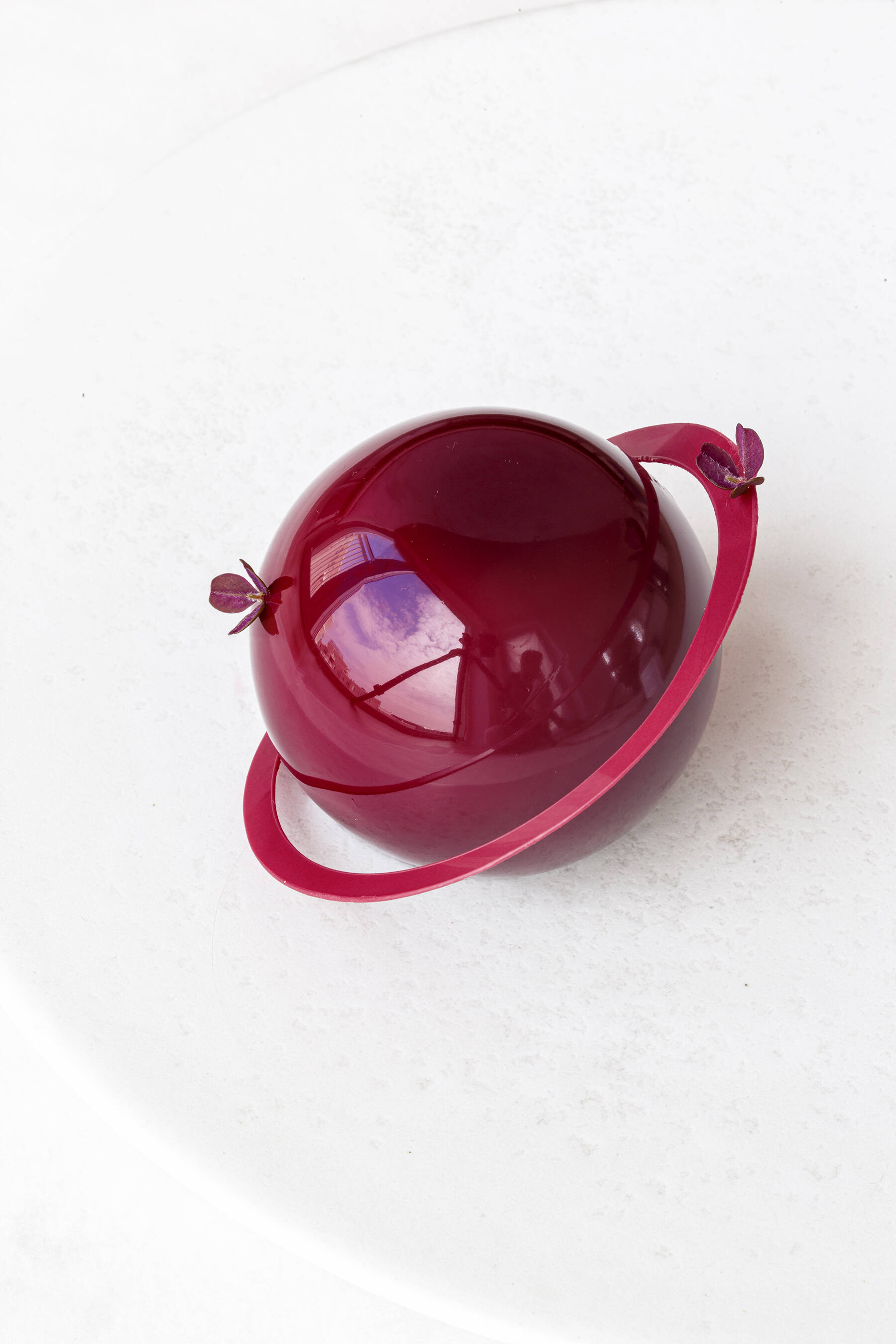 Brownie planet with raspberry